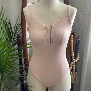 Pink bodysuit